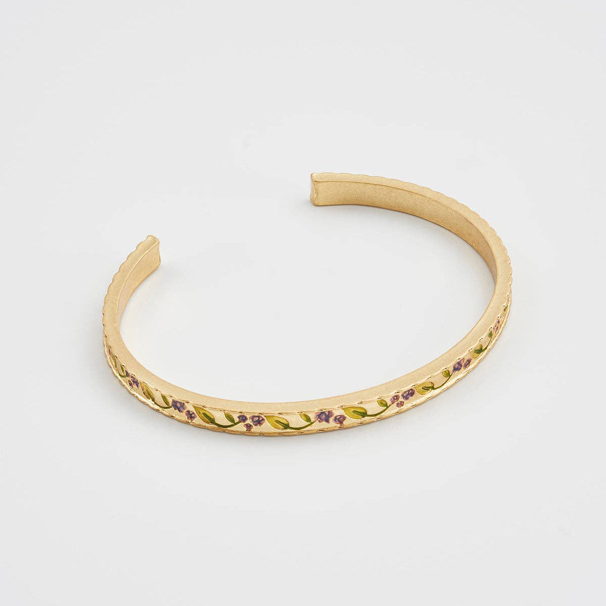 Blackberry bramble bangle stacked with other Fable England bracelets