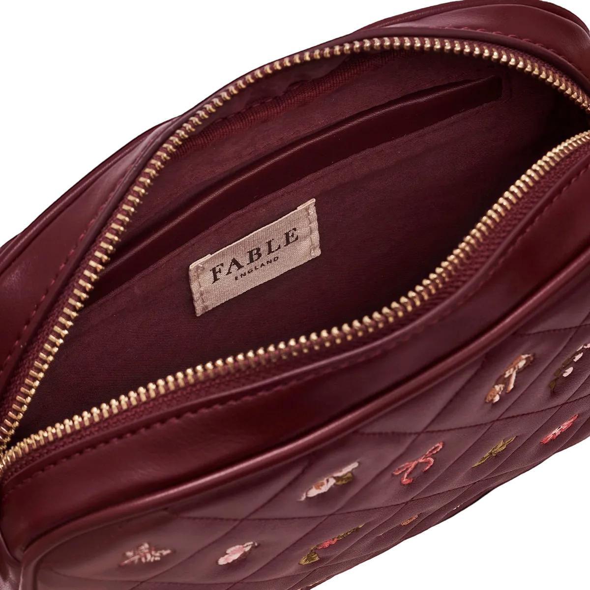 Alice Orla camera bag open showing the lining and zip