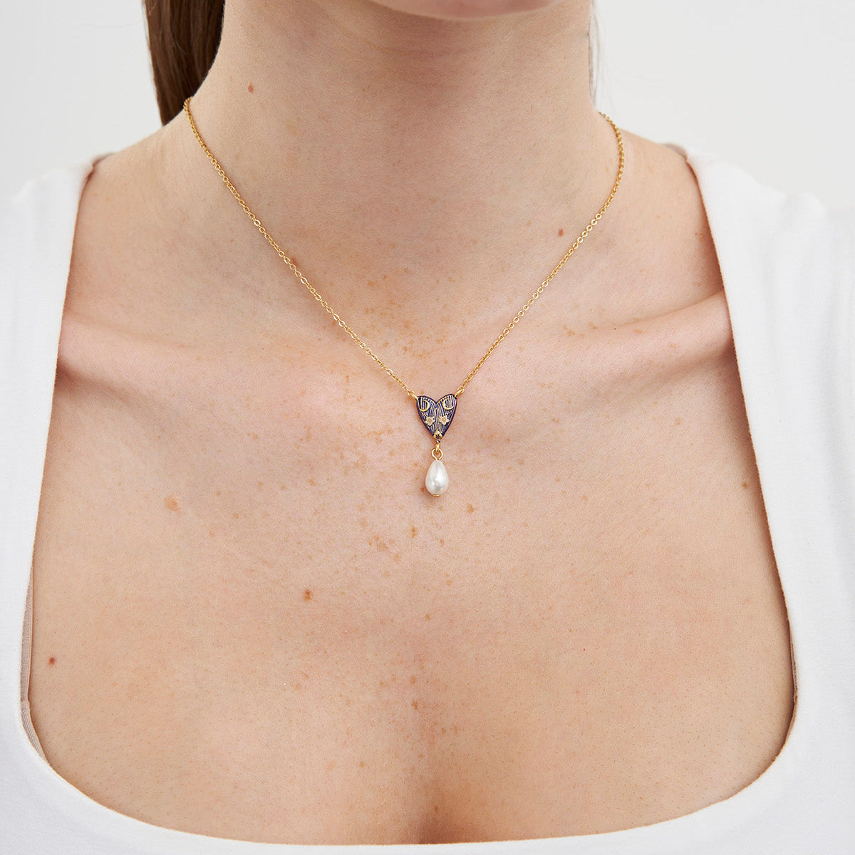 Jasmine Moon pearl necklace worn by a model