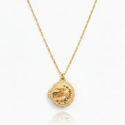 Fable England running bunny locket necklace in gold on white background