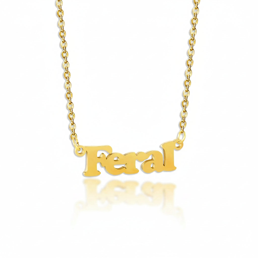 Gold feral necklace displayed flat on white background