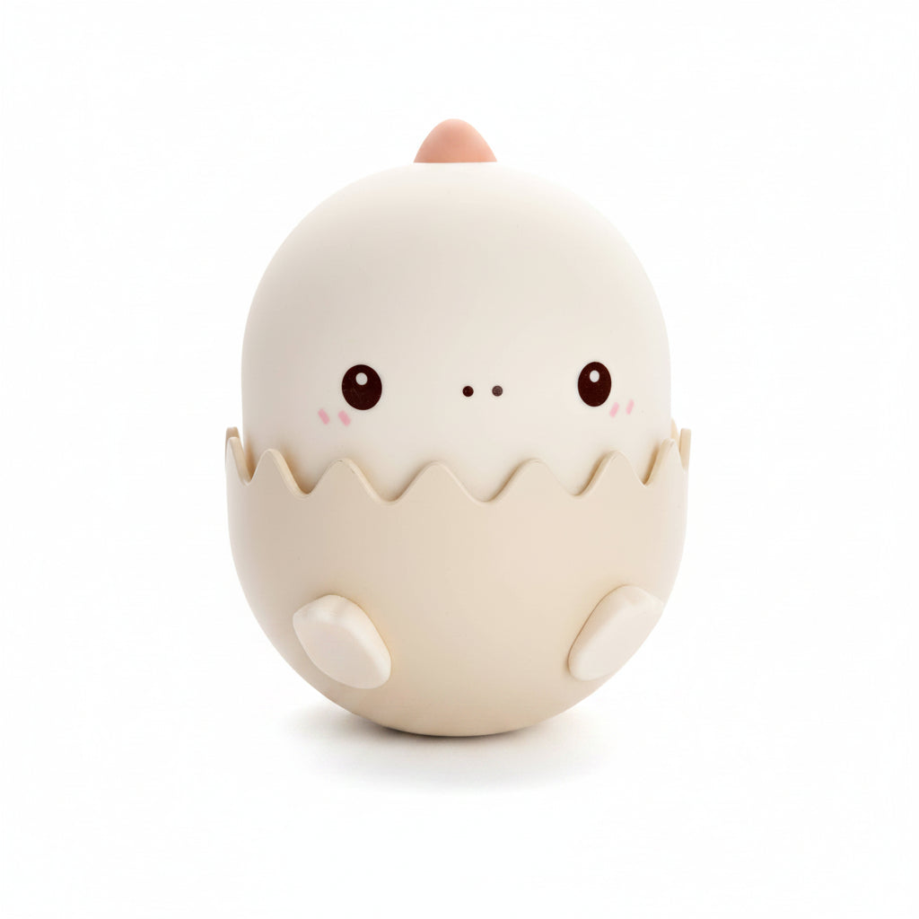 Pink dinosaur-shaped night light with a soft glow