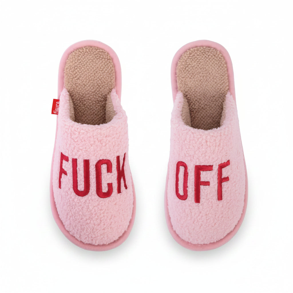 Pink fluffy slippers with red embroidered lettering, side by side