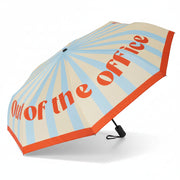 Pale blue folding umbrella open, printed with orange Out Of The Office text