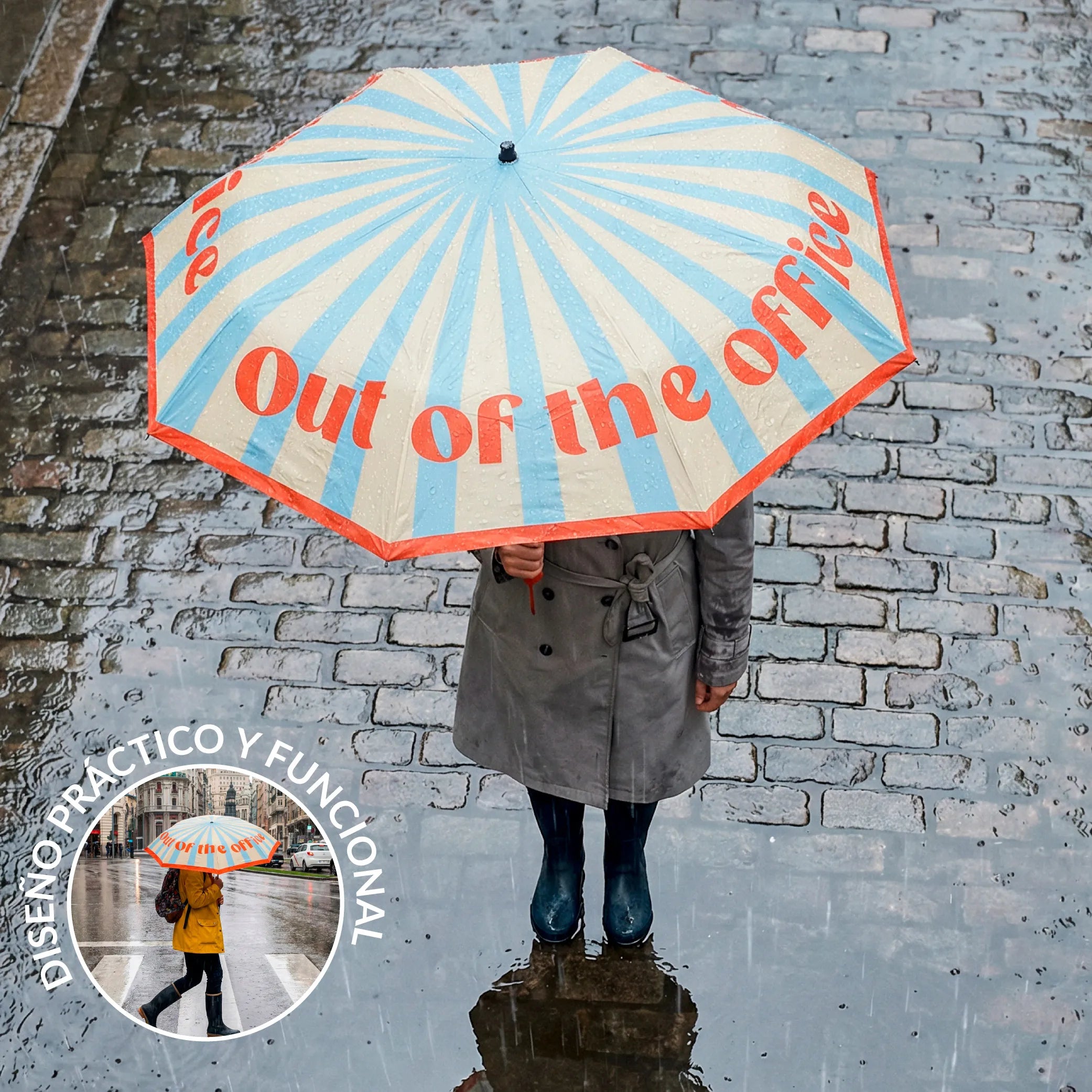 Person holding the blue umbrella over their head on a cobbled street