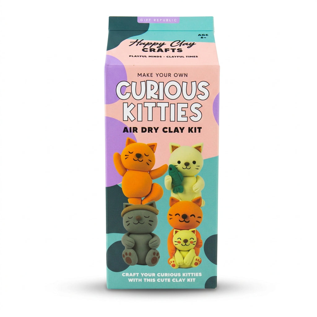 Curious Kitties air dry clay kit box with clay and paints on a table