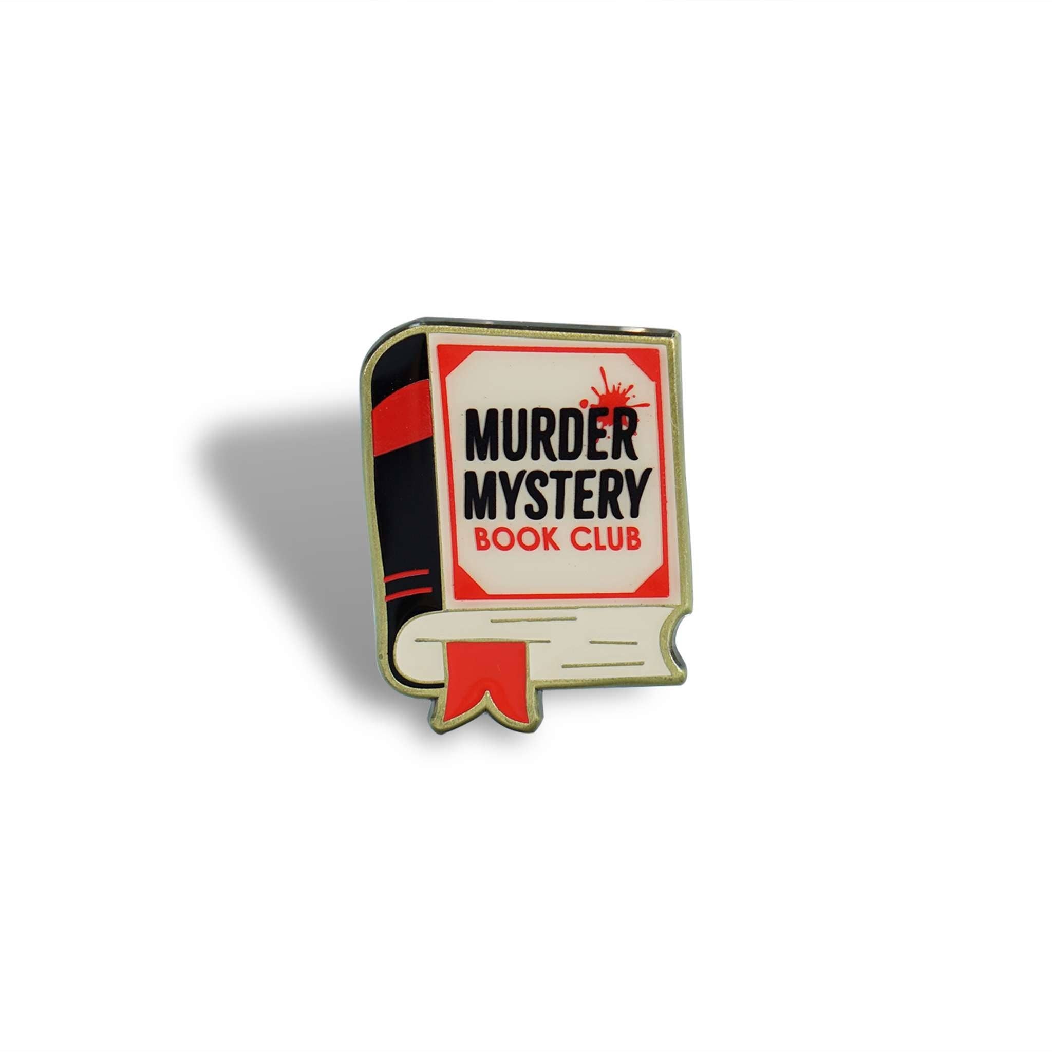 Red enamel pin badge shaped like a book with a ribbon marker