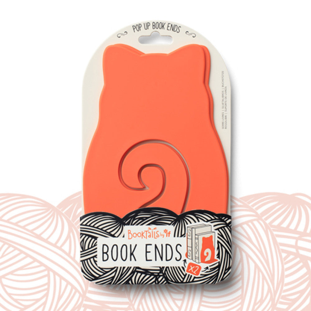 Pair of cat pop-up bookends in warm orange shown in their packaging