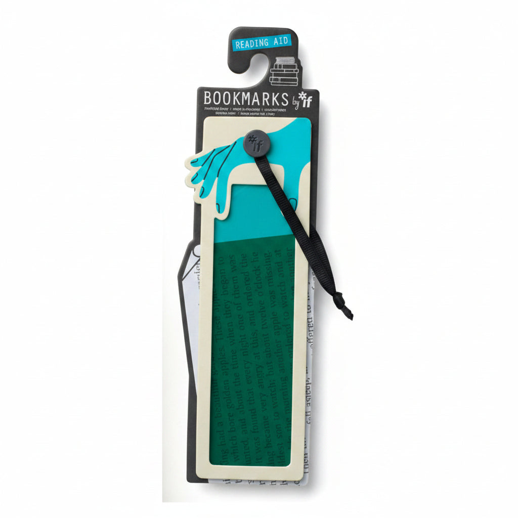Green reading aid bookmark and its packaging shown on an open book