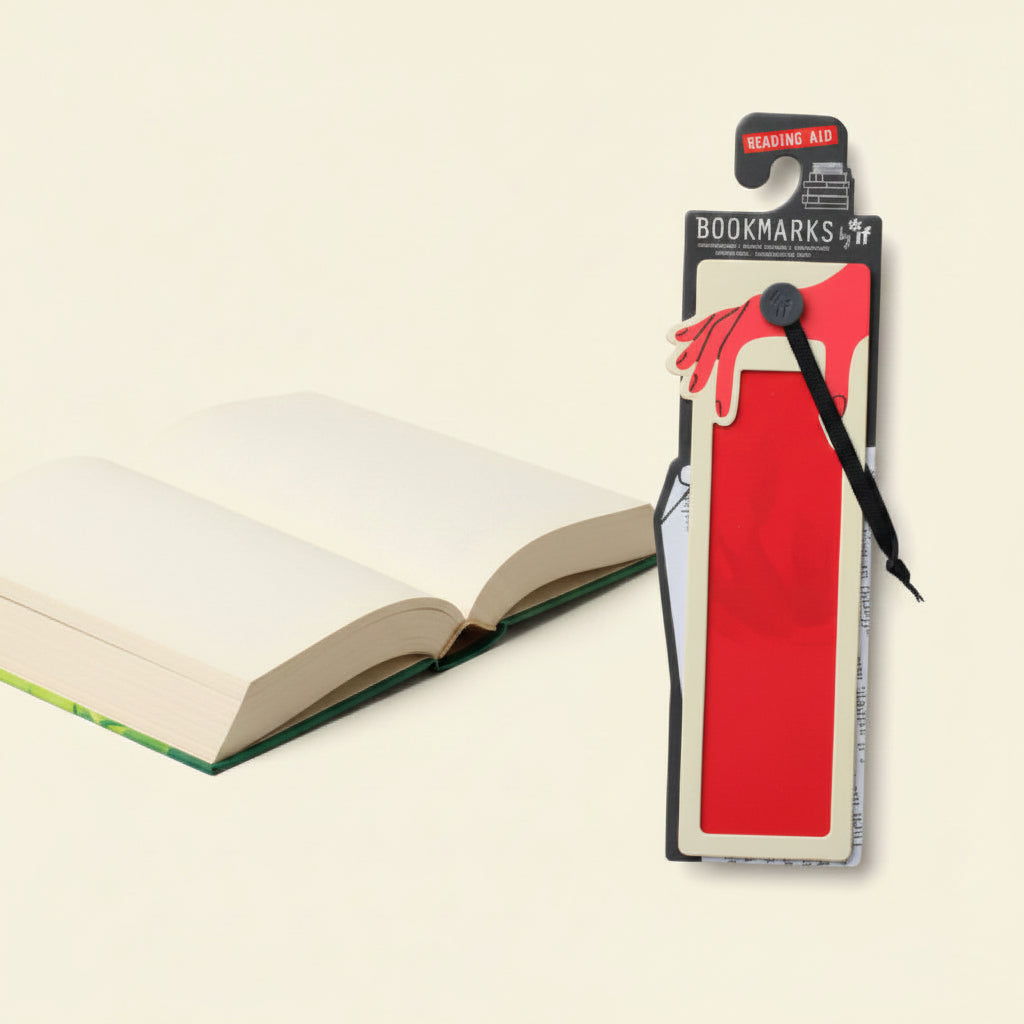 Red tinted overlay bookmark laid across a page of book text