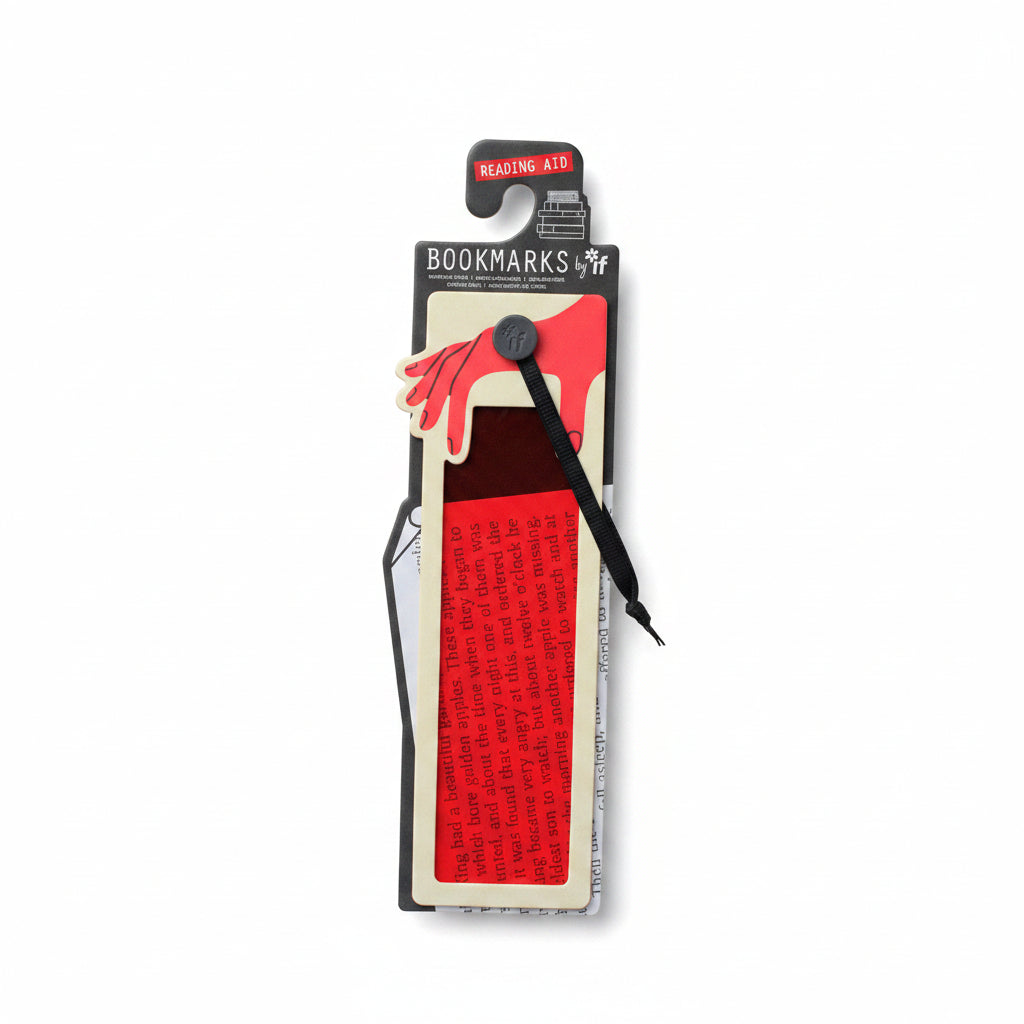 Red reading aid bookmark and its packaging shown on an open book