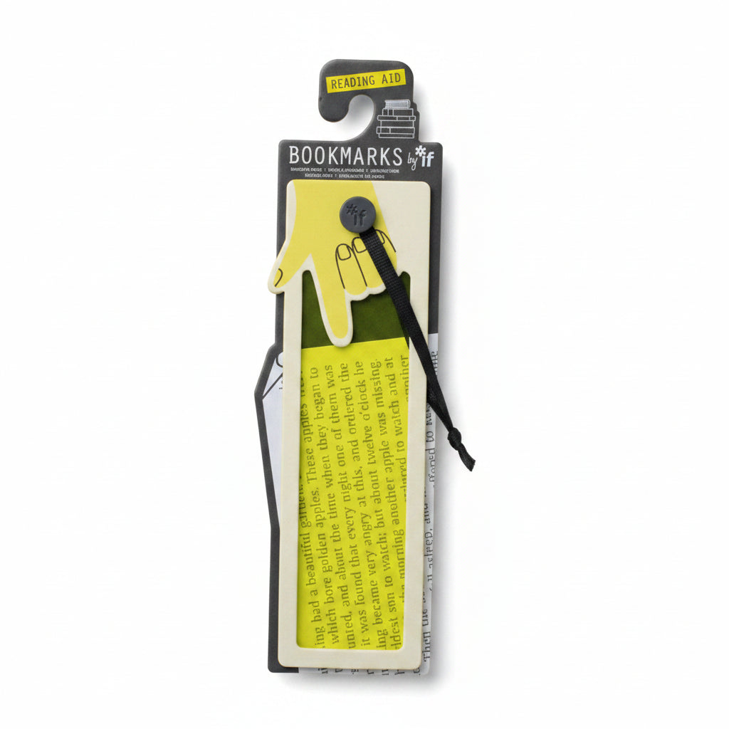 Yellow reading aid bookmark and its packaging shown on an open book