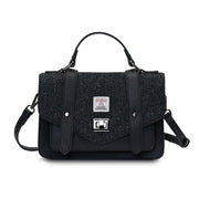 Black Herringbone Medium Satchel with Harris Tweed® shown from the front with top handle and detachable shoulder strap.
