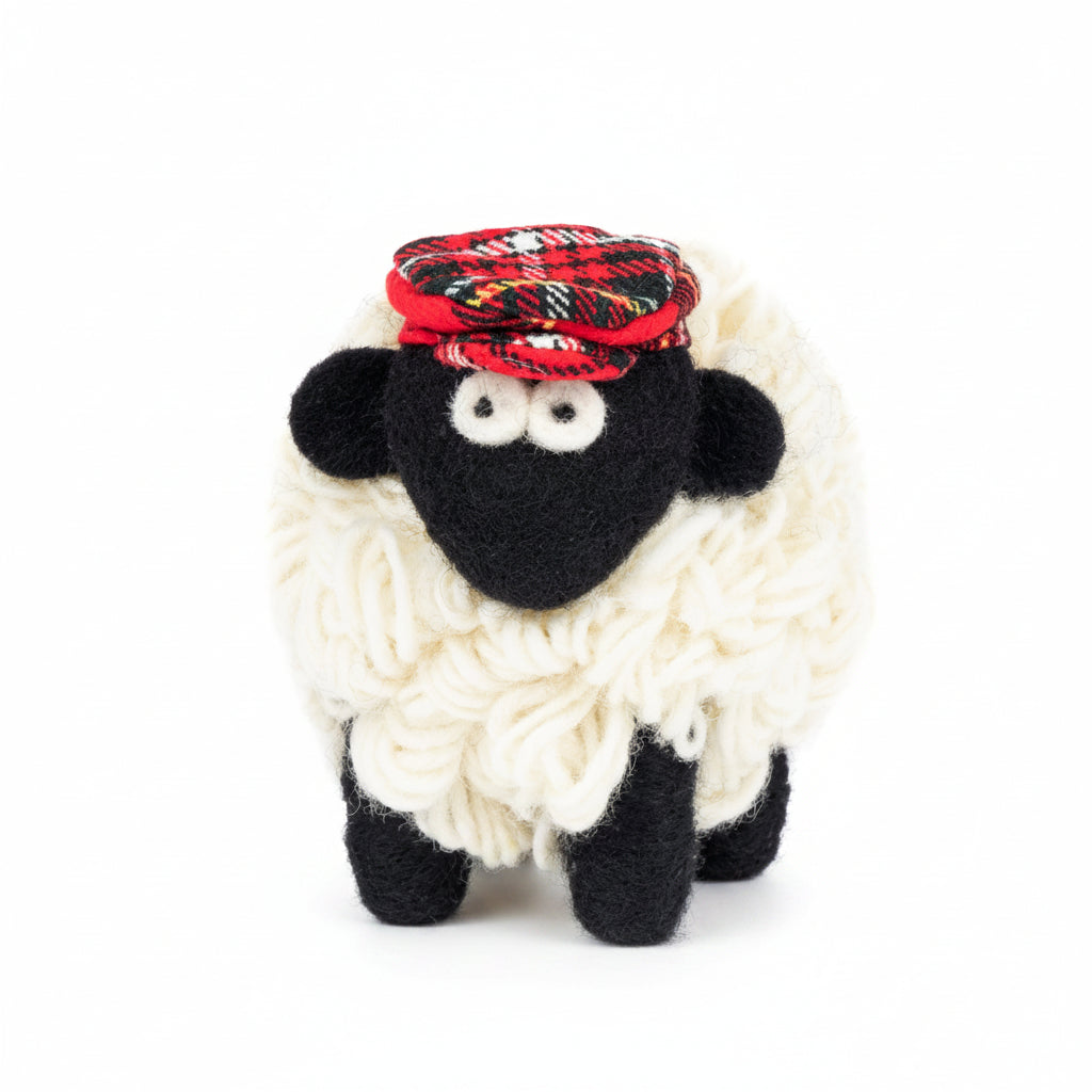Erin Knitwear wool sheep figurine wearing red tartan flatcap on white background