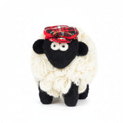 Erin Knitwear wool sheep figurine wearing red tartan flatcap on white background