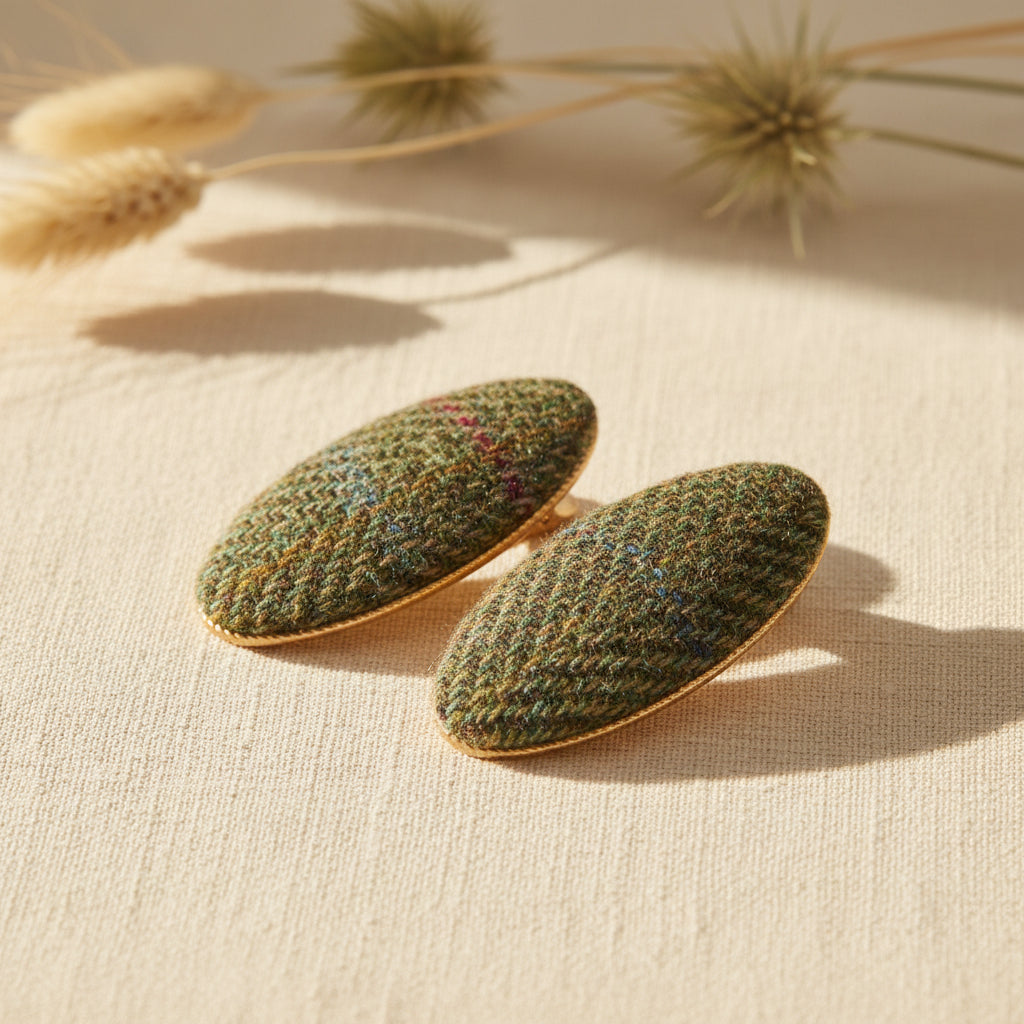Chestnut herringbone tweed oval hair clips styled as a small gift