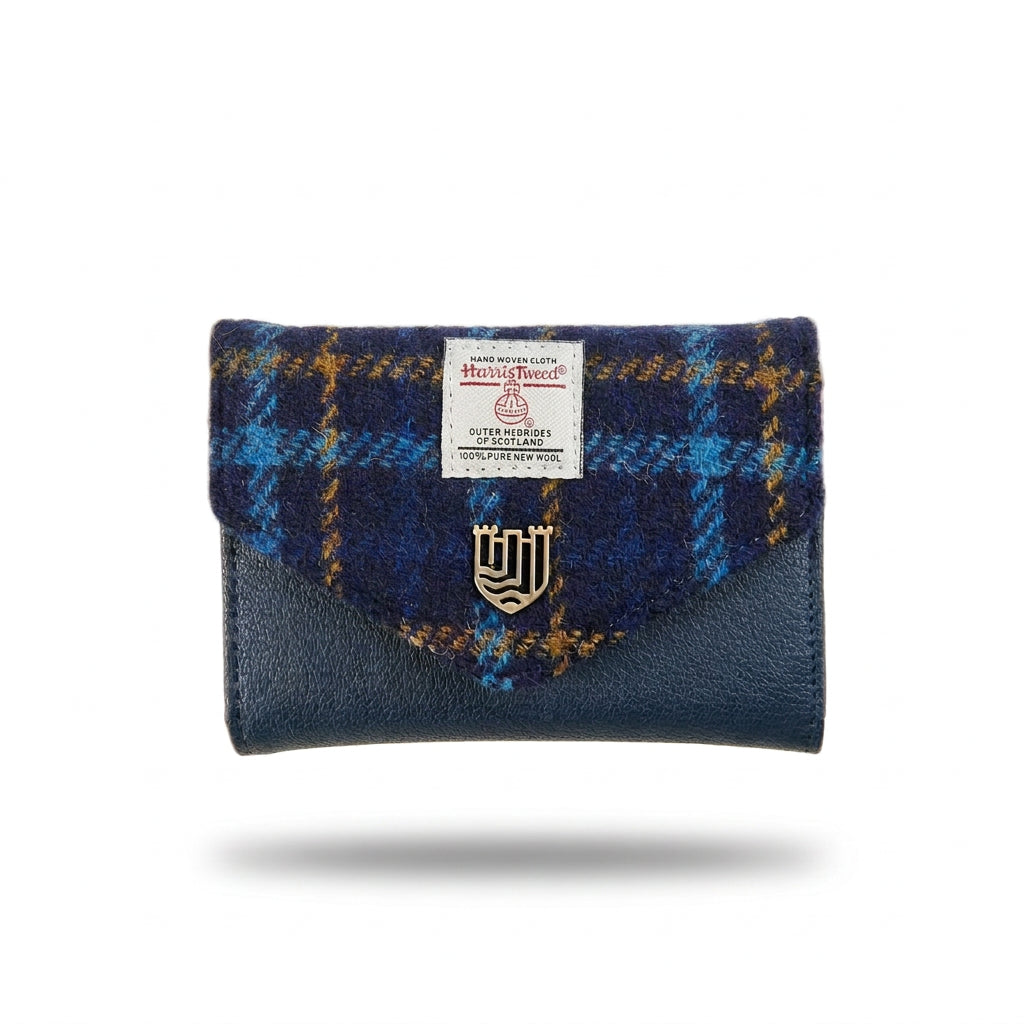 Navy tartan Harris Tweed clasp purse overhead view on white background.