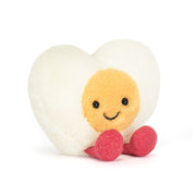 Jellycat Heart Boiled Egg soft toy with yolk face and pink feet on white