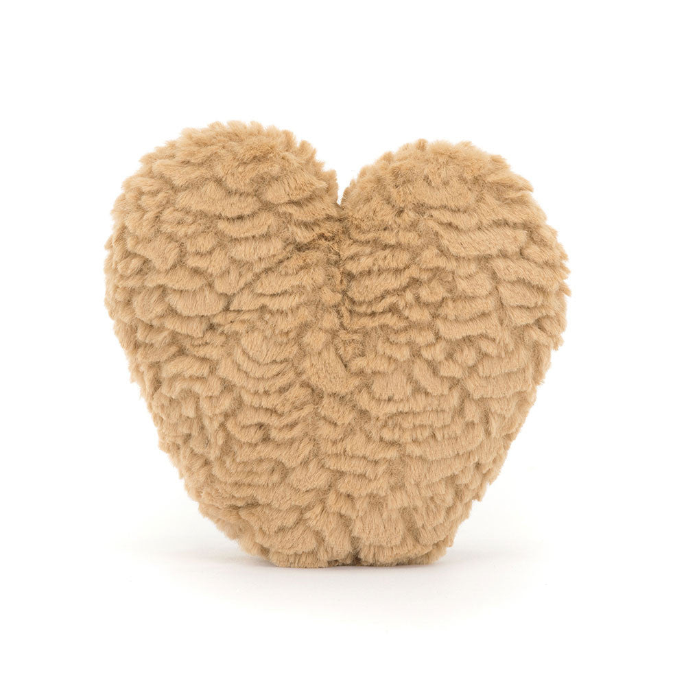 Back view of the curly biscuit-brown Philippe Palmier pastry plush on white