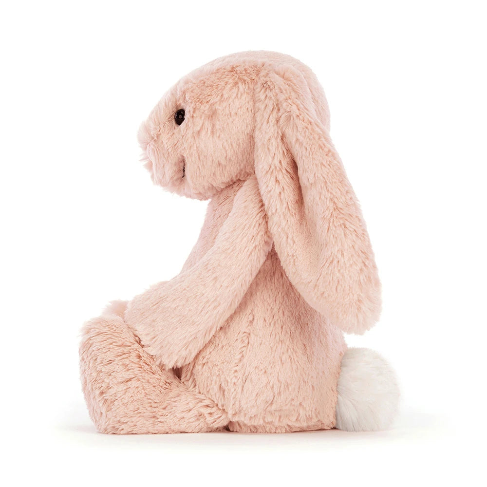 Bashful Blush Bunny side view showing long floppy ears, white background