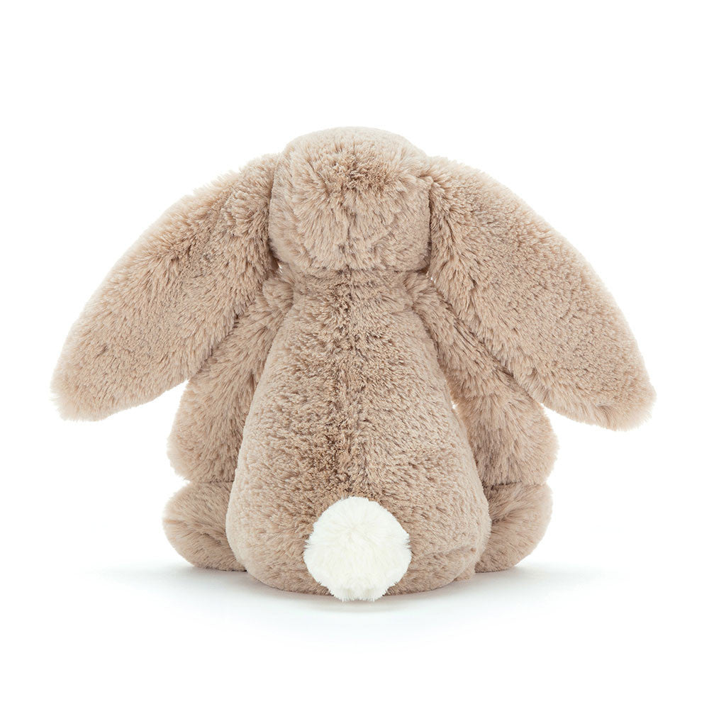 Back view of the beige Jellycat Bashful Bunny Original with its round white bobtail