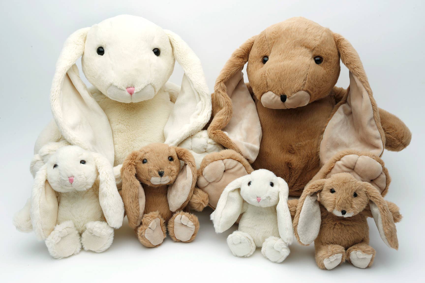 Jomanda bunny plush family in cream and brown on white background