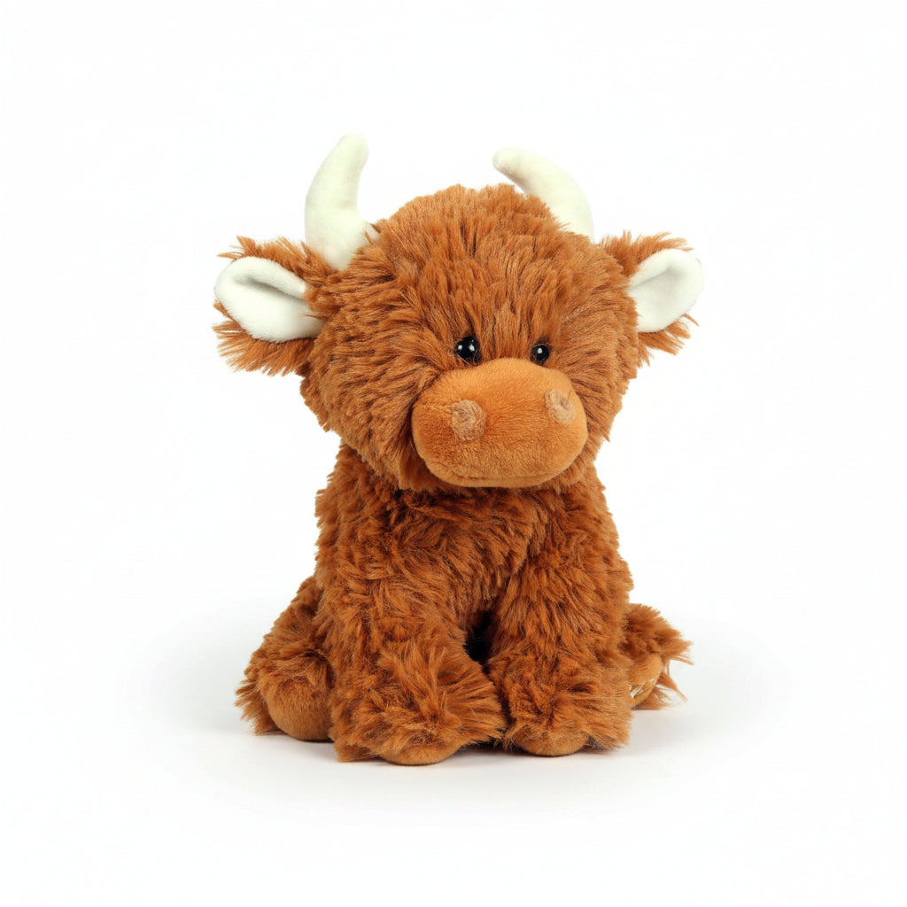 Highland cow plush brown soft toy sitting facing forward on white background