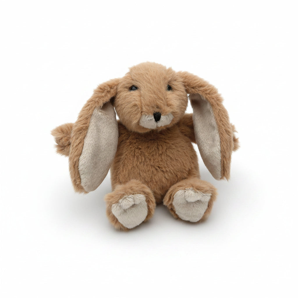 Mini brown bunny plush toy sitting on a white background