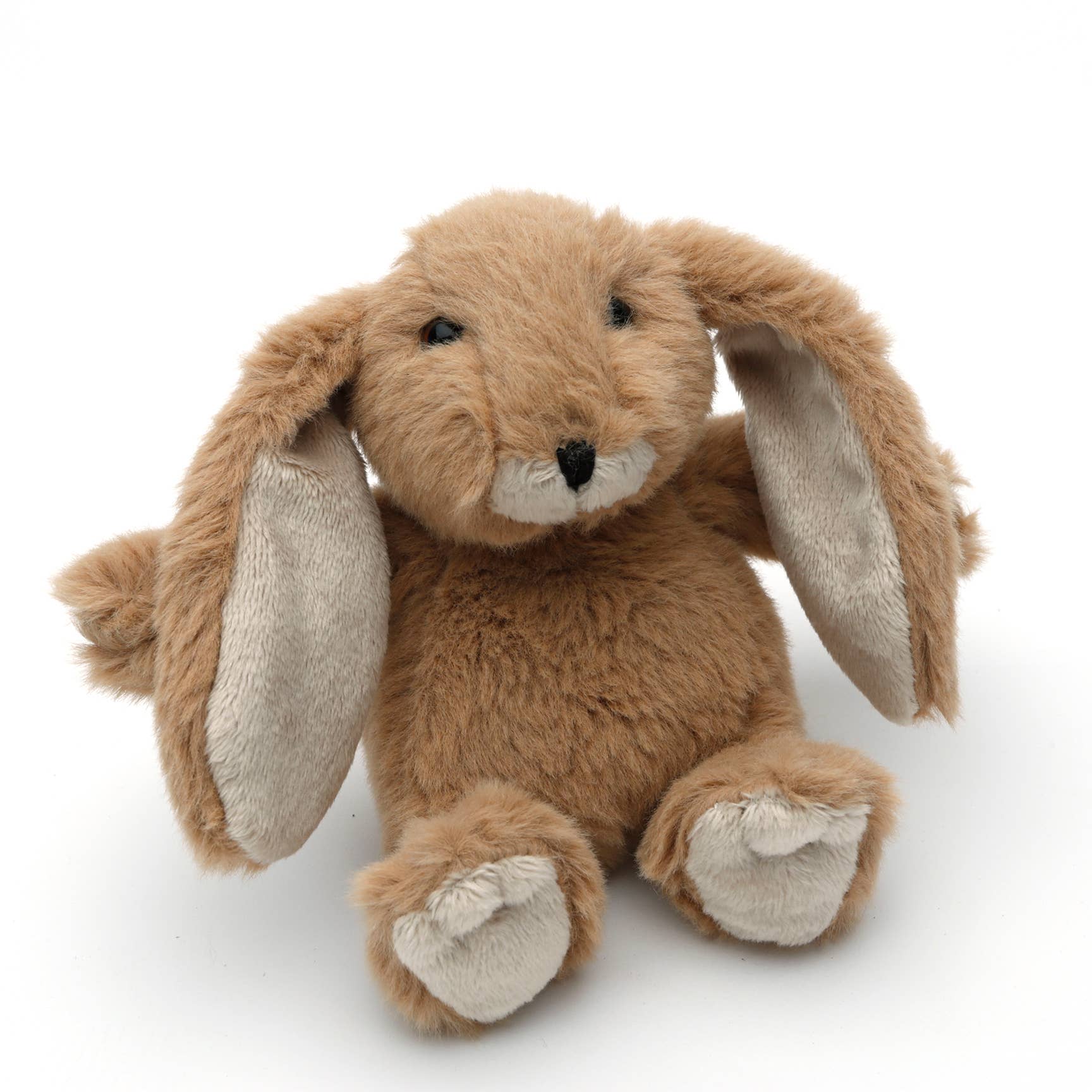 Mini brown bunny plush toy sitting on a white background