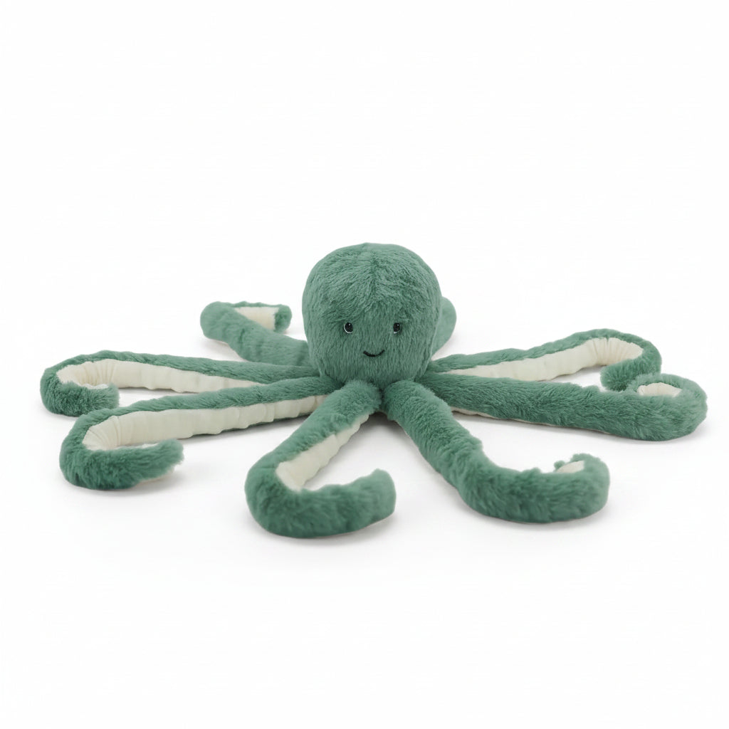 Sage green octopus toy with cream ribbed tentacles spread out, front view