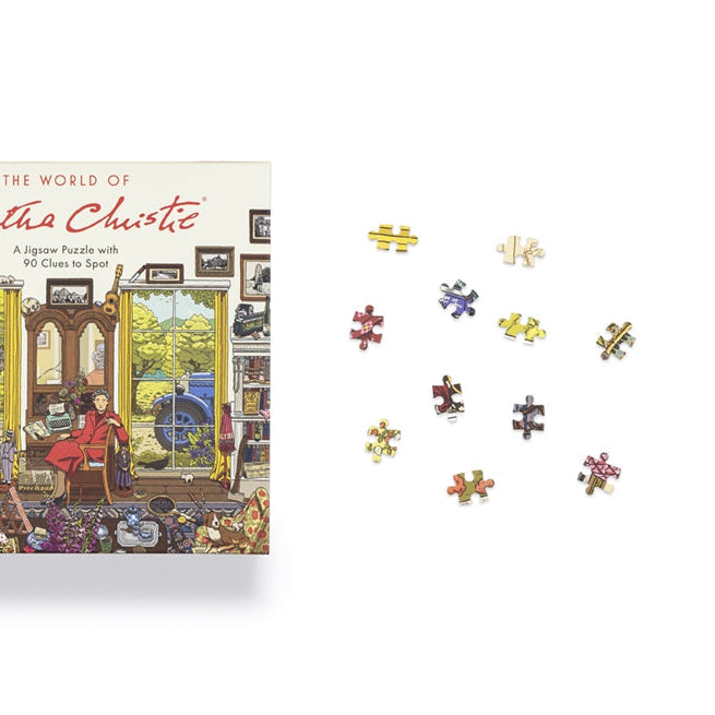 World of Agatha Christie jigsaw box front with loose pieces on a white background