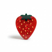 Glossy red resin strawberry claw clip with painted seeds and green top