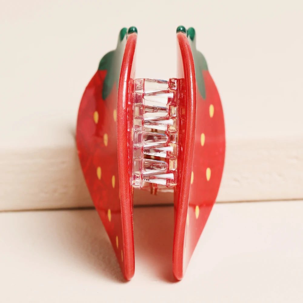 Strawberry hair clip opened to show the claw teeth inside