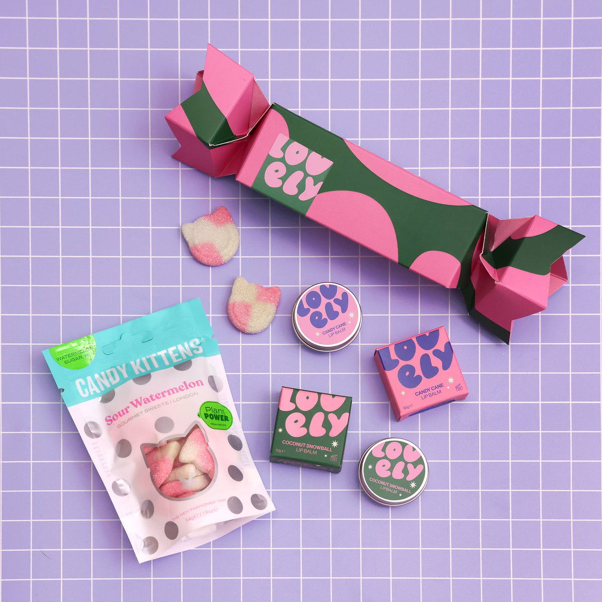 Lovely Skincare Christmas cracker gift set with lip balms and sweets styled lifestyle view