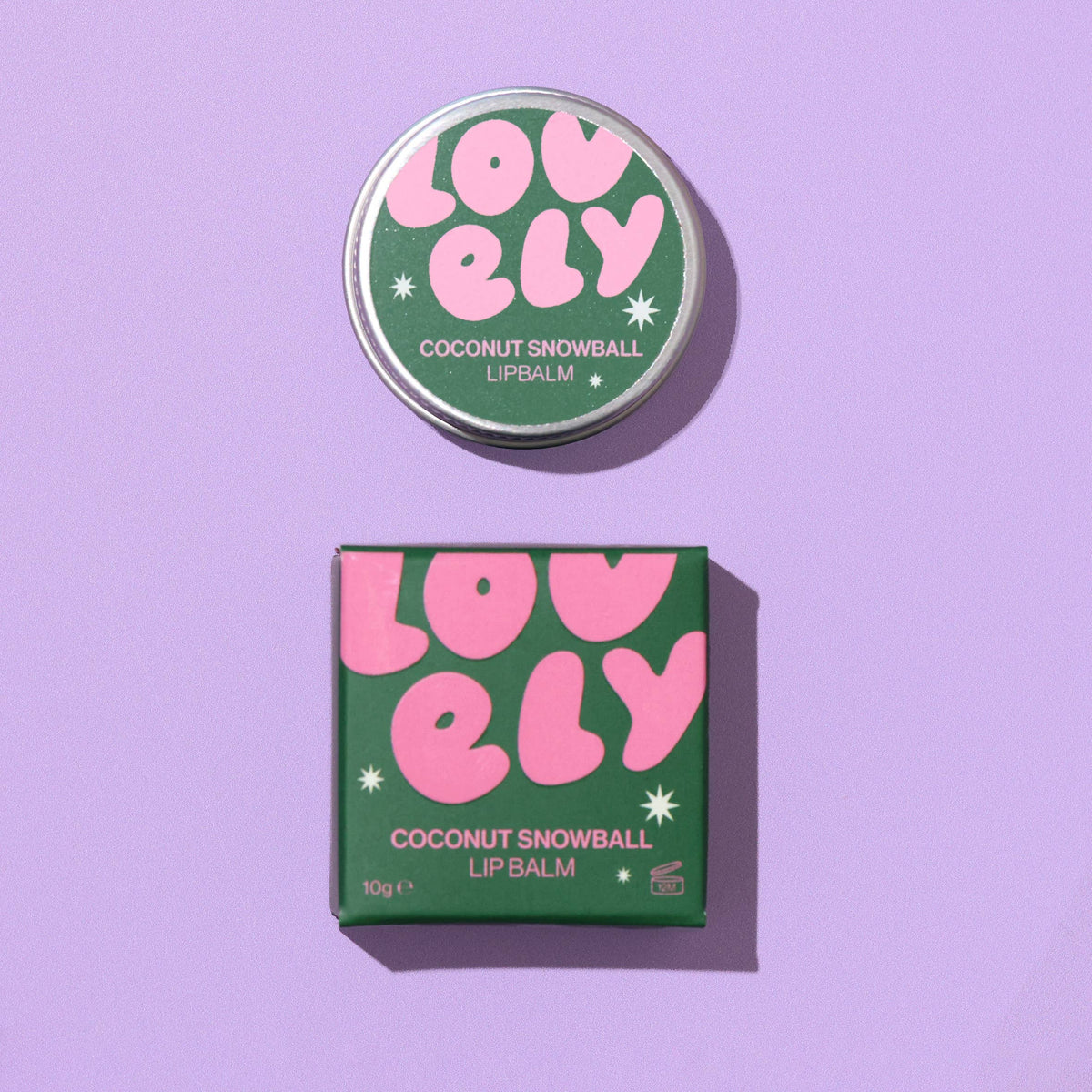 Coconut Snowball lip balm tin and box on a lilac background