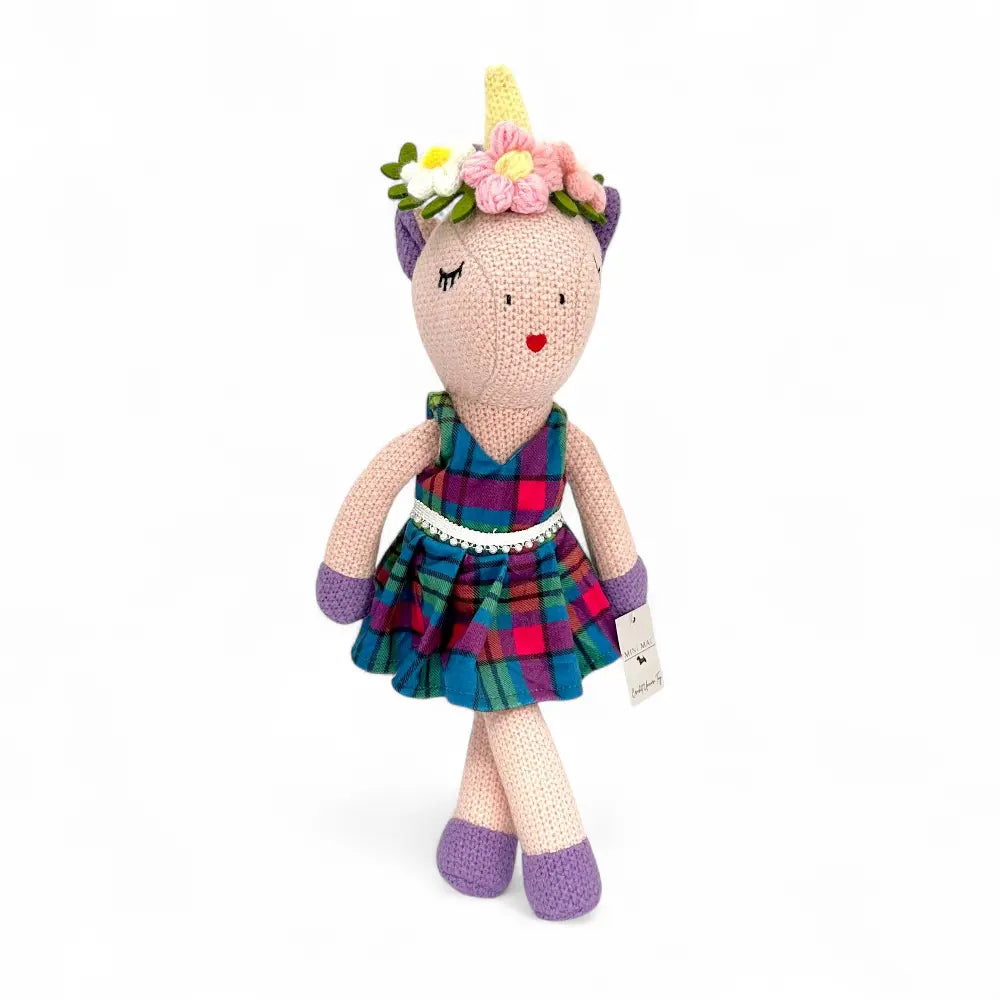 Annie crochet unicorn doll seen from another angle showing her purple hooves