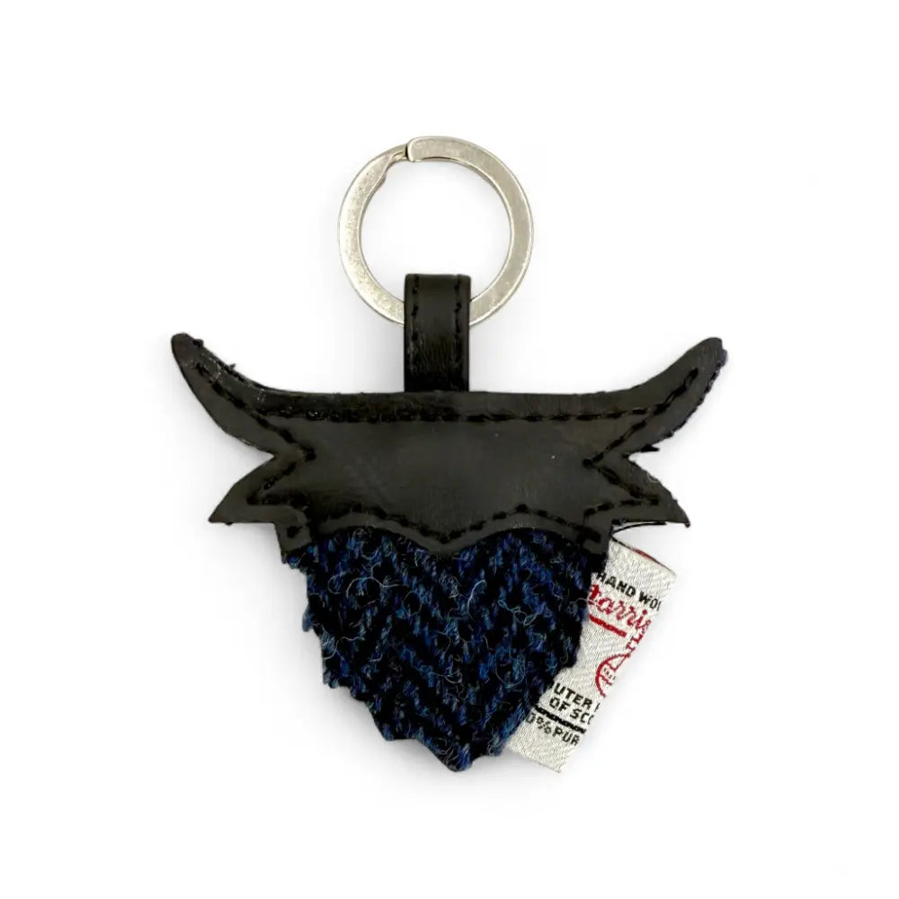 Navy herringbone Harris Tweed Highland cow keyring with black leather face and horns