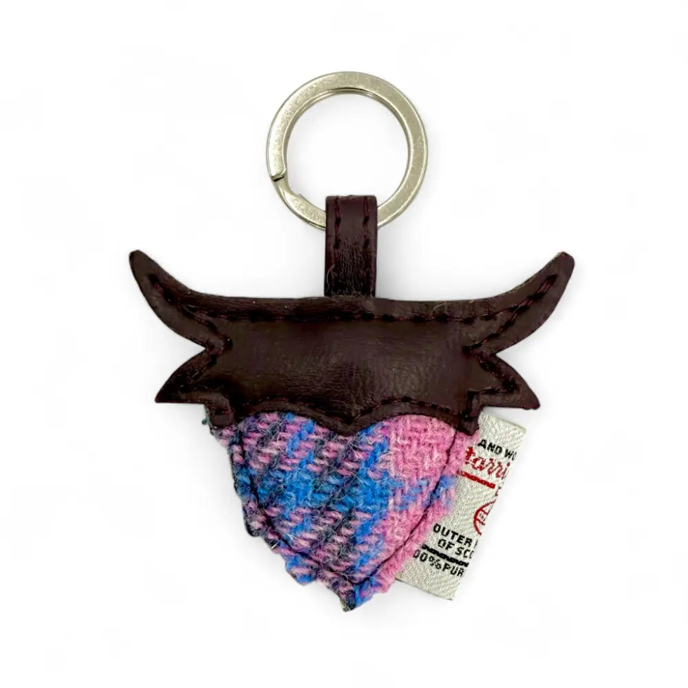Pastel pink Harris Tweed Highland cow keyring with dark leather face and horns