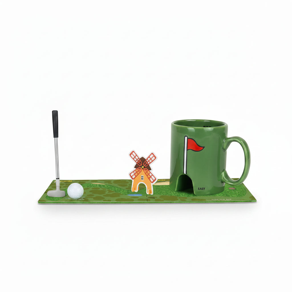 Mini golf coaster course set up with mug hole and golf club pen
