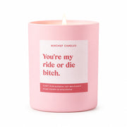 You're my ride or die bitch funny candle in a pink jar, lit on a stand