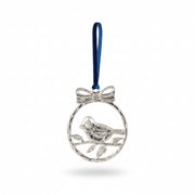Silver aluminium robin in a bowed ring on blue velvet, hanging on a tree