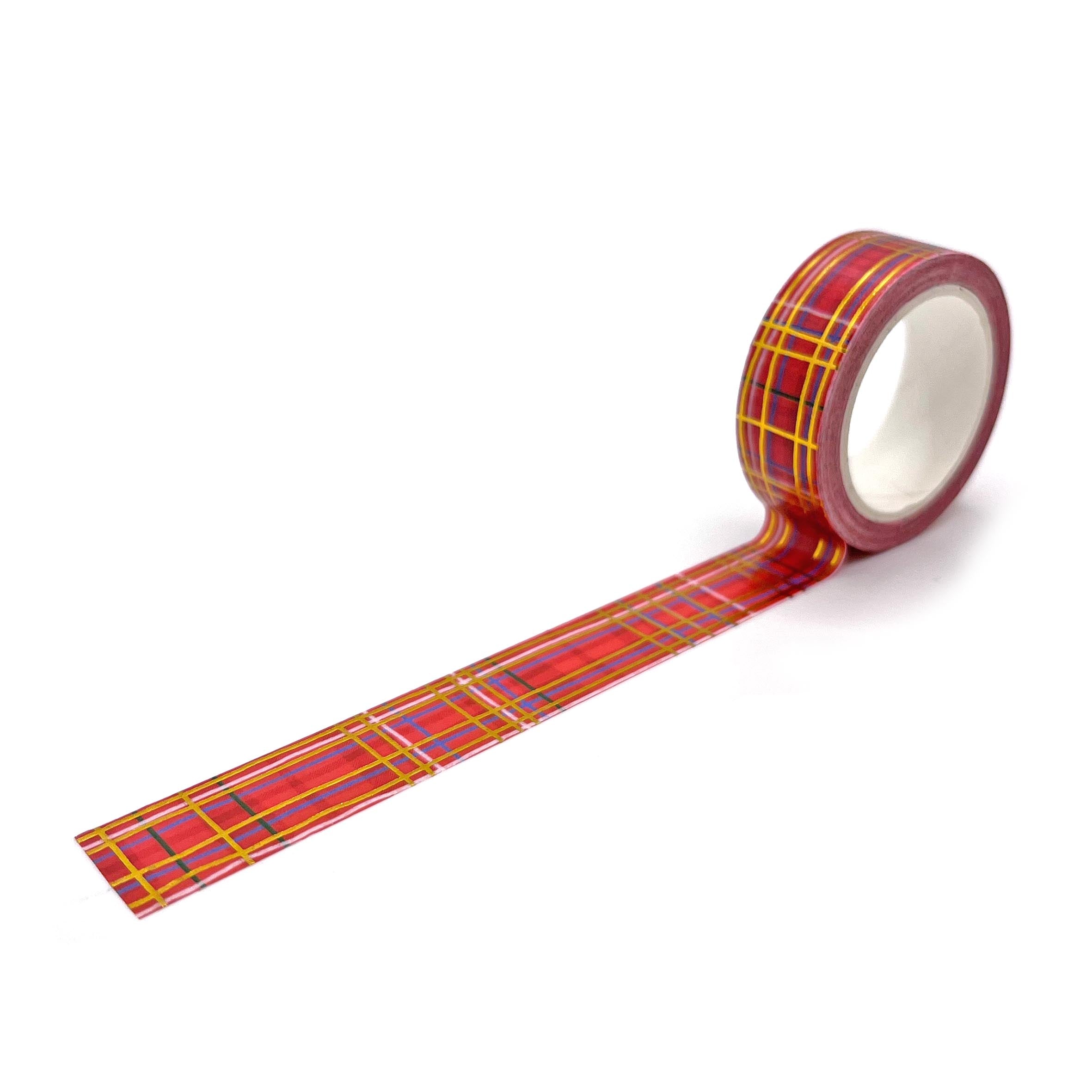 Tartan washi tape unrolled to show the red and green check pattern