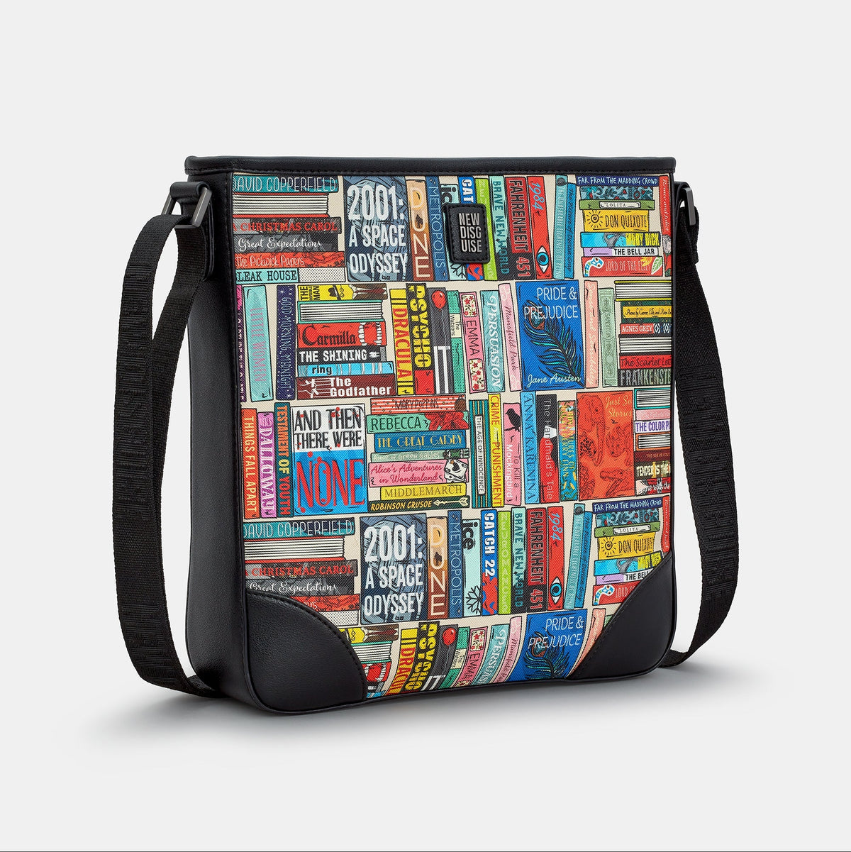 Classic Library Maxi Cross Body Bag in book spine print, black trim, side view