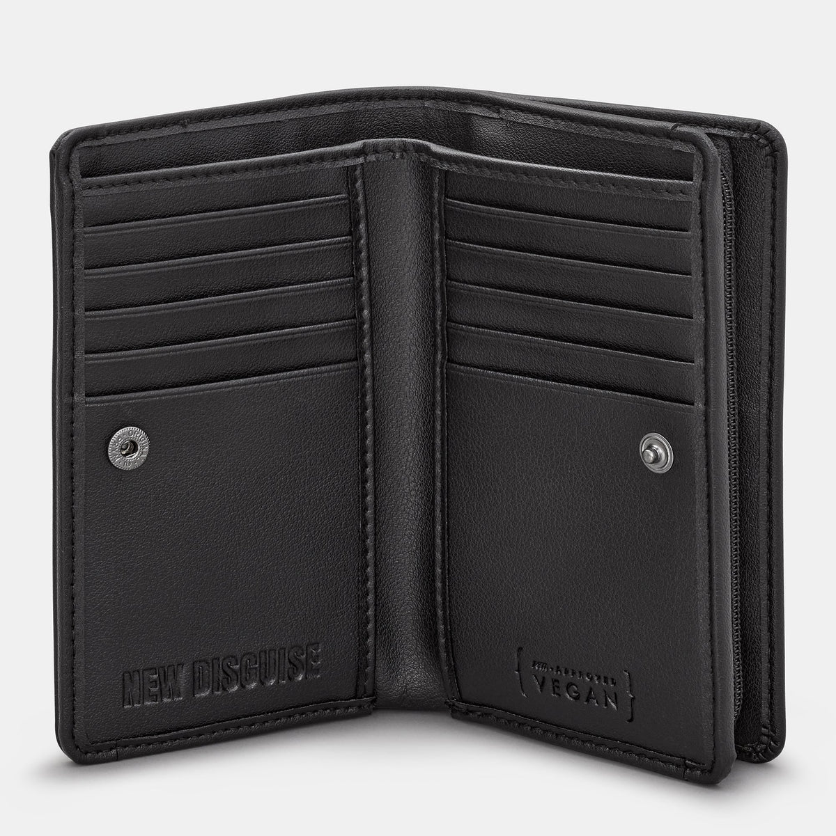 Classic Library Zip Around Purse in book spine print, black trim, open, showing the card slots