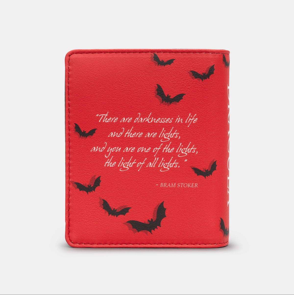 Dracula Book Cover Purse in red and black, back view with the quote