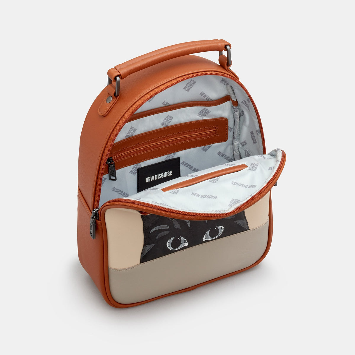 Gatto Cat Backpack in mocha and cream, open, showing the lined interior