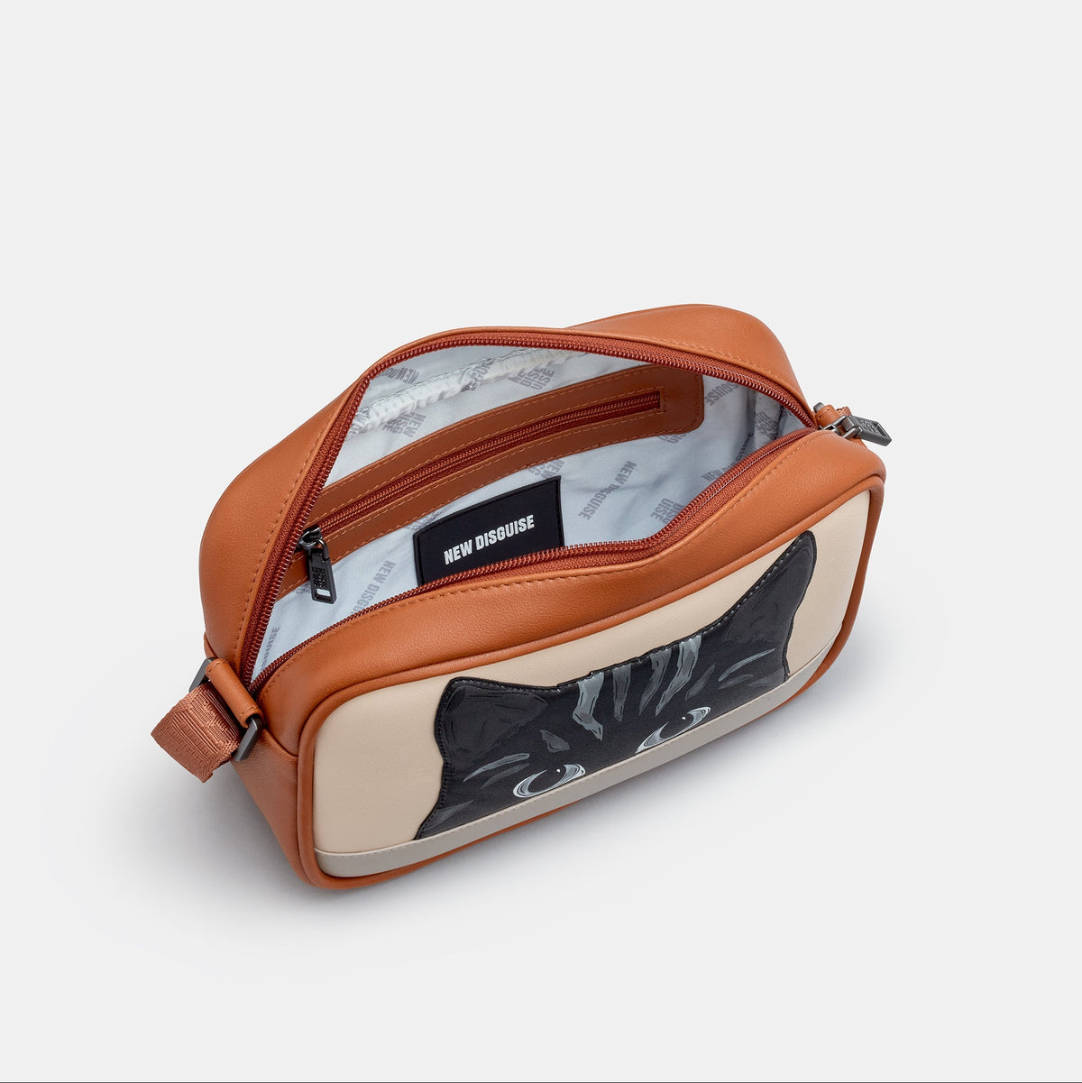 Gatto Cat Cross Body Bag in mocha and cream, angled view
