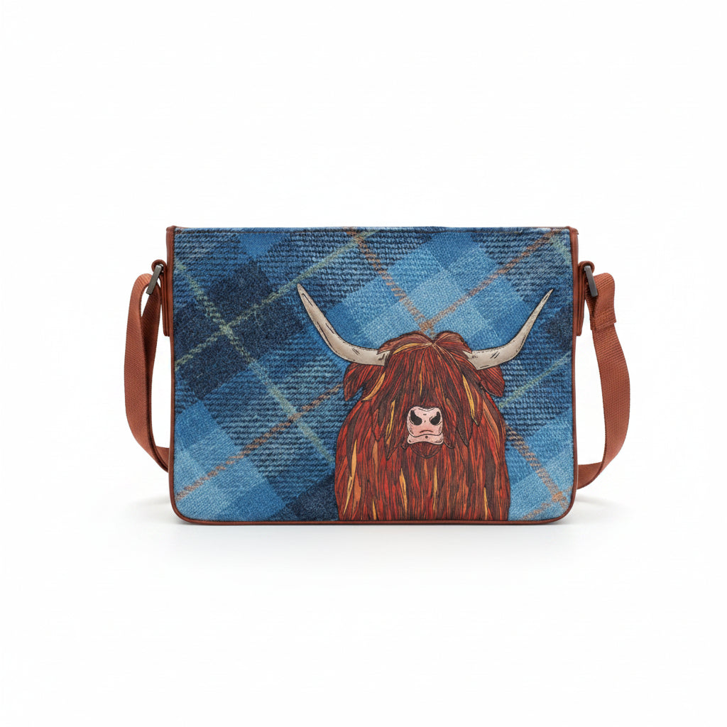 Highland cow cross body bag in blue tweed-effect vegan leather, front view on grey