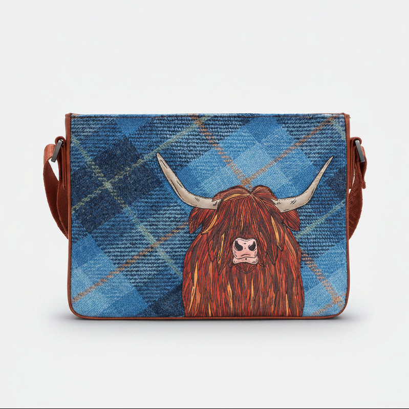 Highland cow cross body bag in blue tweed-effect vegan leather, front view on grey