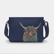 Highland cow cross body bag in navy vegan leather, front view on grey
